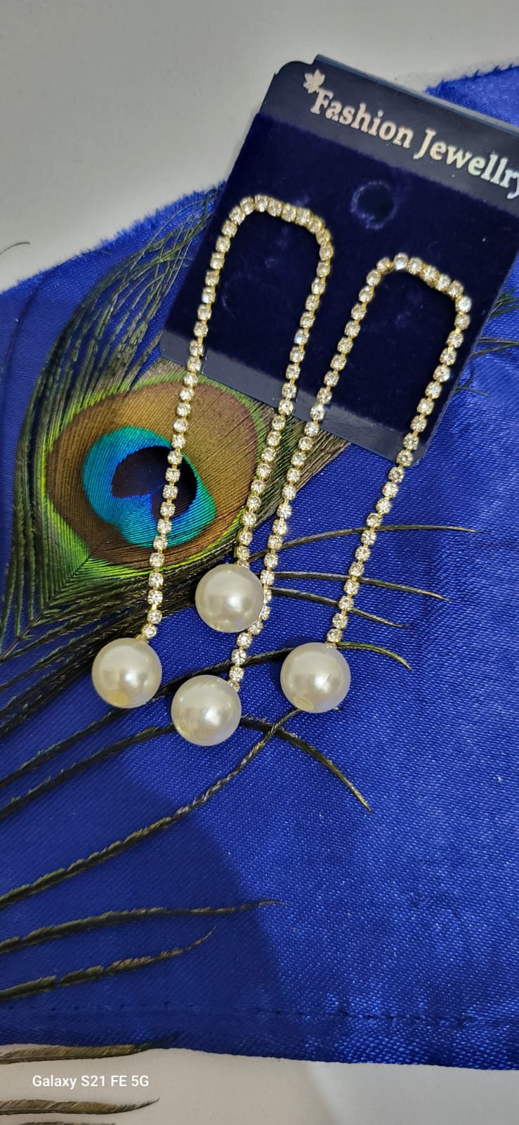Double drop pearl earrings
