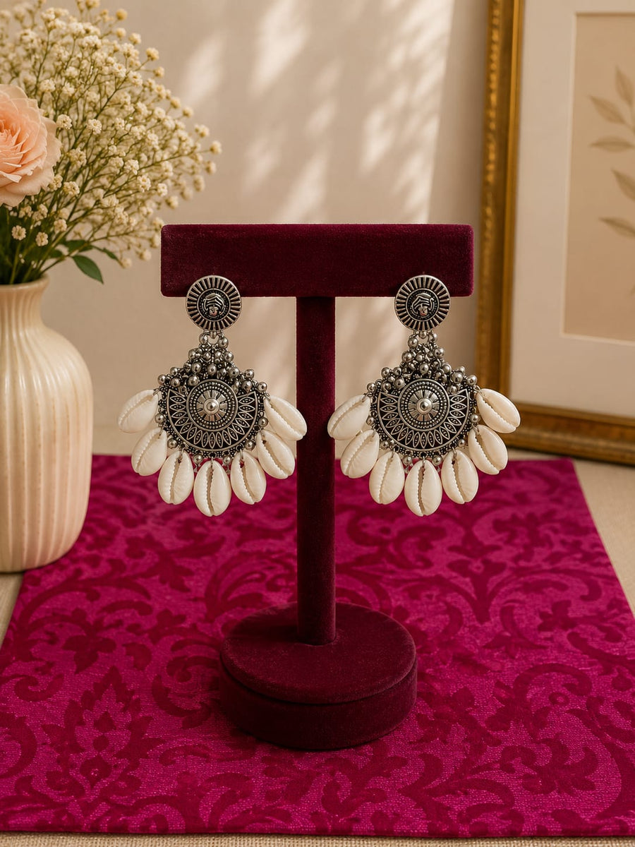 Oxidise earrings with cowrie shell